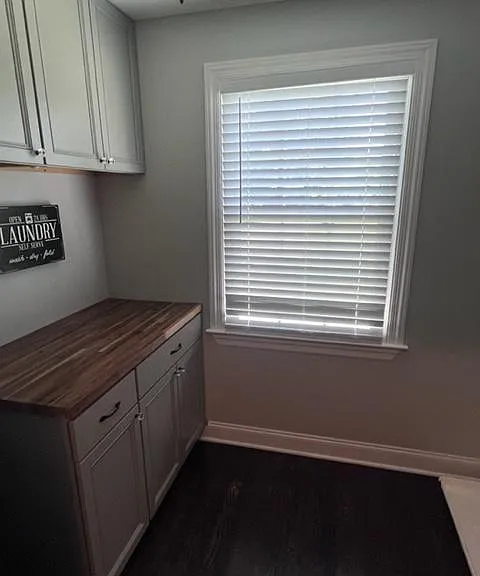 large laundry room with additional storage