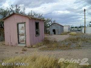 Storage shed with garage in back.