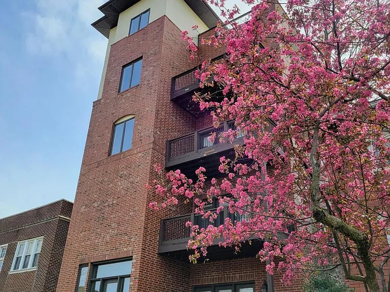 4-plex building, one unit in each floor