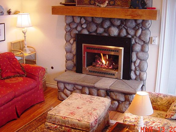Gas fireplace in living room is furnace rated to supplement the gas furnace