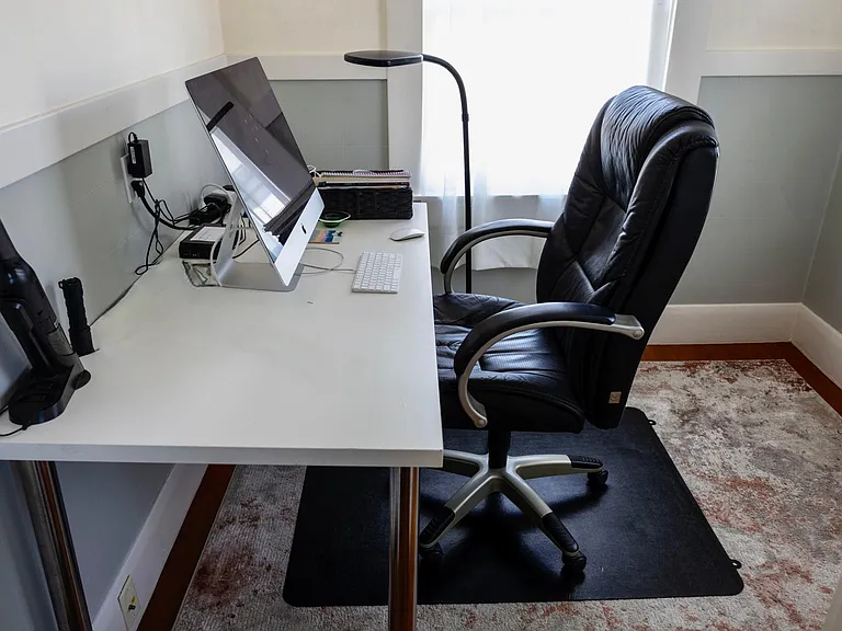 Use small room off of kitchen as an office or guest room
