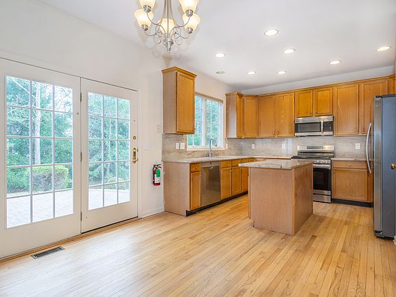 RENOVATED KITCHEN WITH GRANITE COUNTERS & SS APPLIANCES