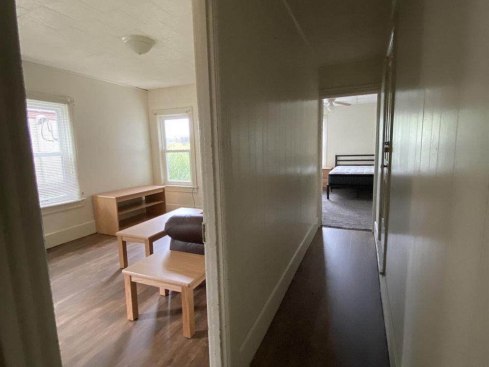 Coming from the bathroom, looking toward the bedroom and living room.