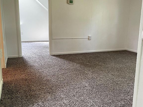 Living area - new carpet installed throughout!