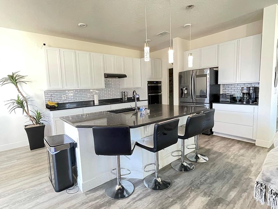 Beautiful kitchen with quartz countertop and smart appliances