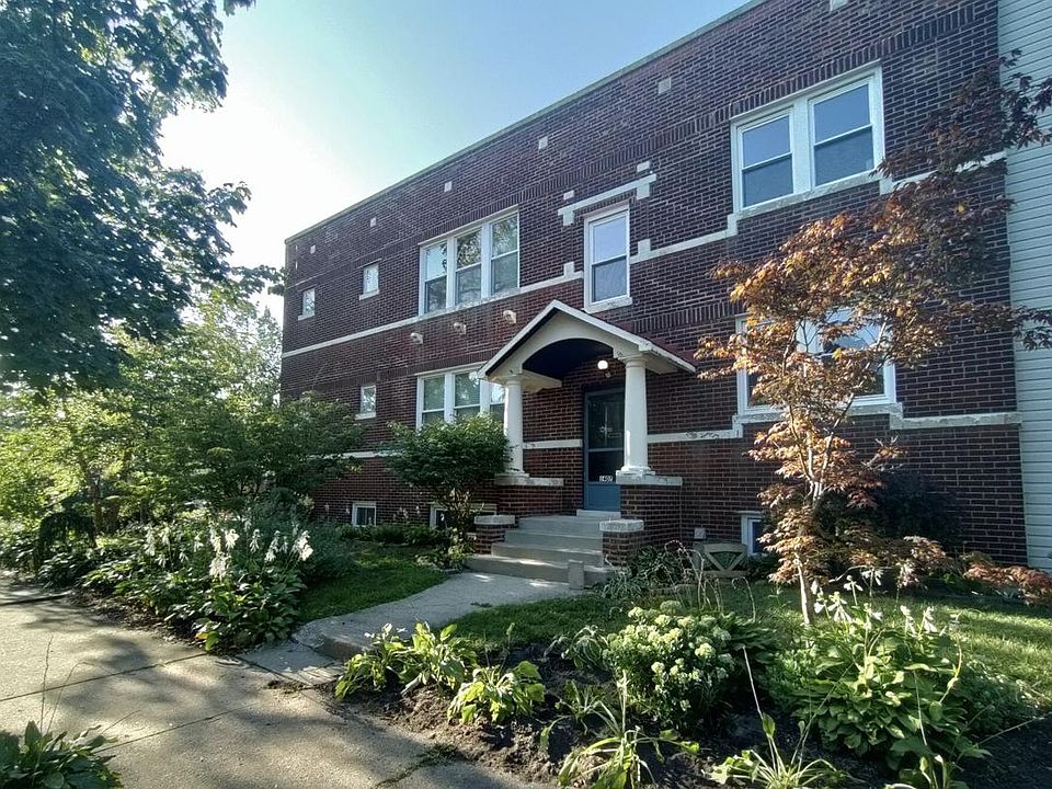 Front of building; unit is entire first floor.