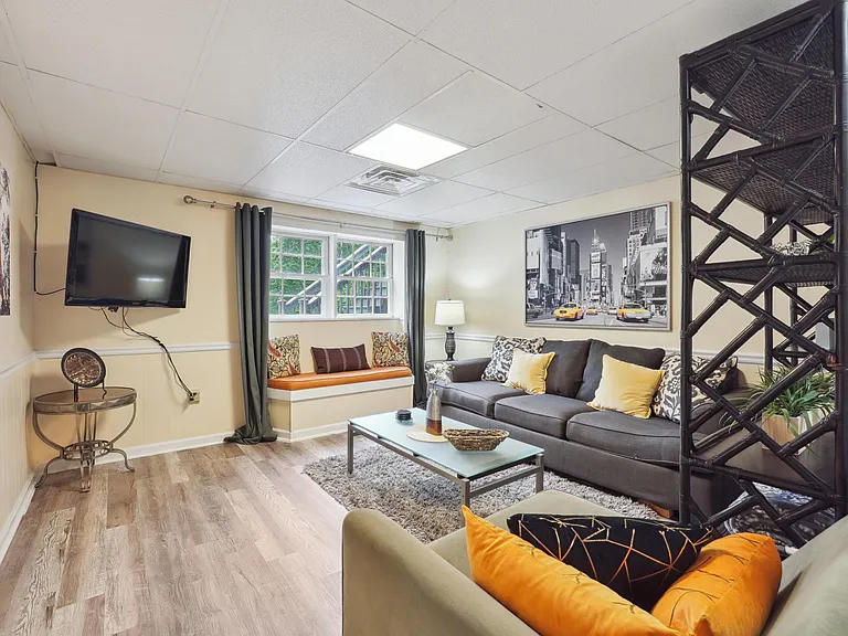 Living Room Area with TV -Basement Level