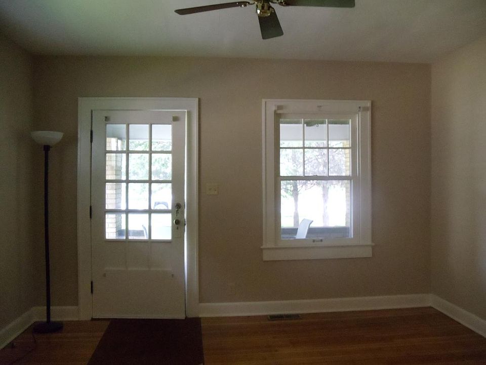 Room in front of home looking onto front porch.