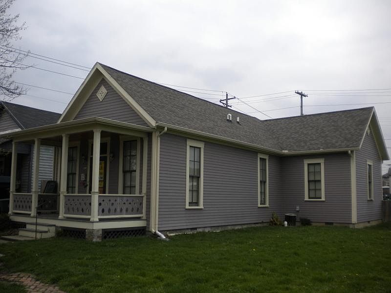 Exterior front view from the west. Modern cozy 2 bedroom house. No neighbors and a vacant mowed lot next door. Off street parking at the rear.