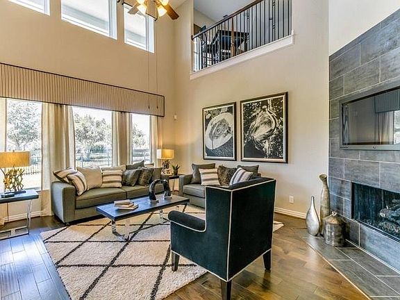 Family room with vaulted ceiling and gaslog fireplace