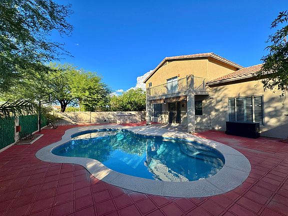 Large pool in backyard, basketball court, pool storage bin, renovated bar