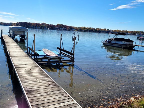 View of Union Lake and Access Lot Dock. Looking Southwest. Usage of public area for swimming is included in lease. Boat Docking is included with a shared fee of Dock installation and removal each year..