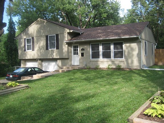 Curb appeal - Healthy lawn, mature shade trees, and perennial gardens.  