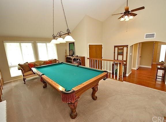 Formal living room used as a game room