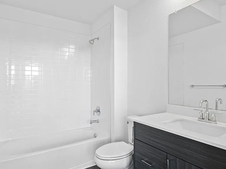 Adjacent 5 Piece Bath to Secondary Bedroom Suite on 1st Floor