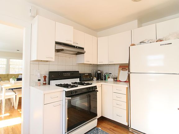 Stove and refrigerator. Looking towards the front of the house.