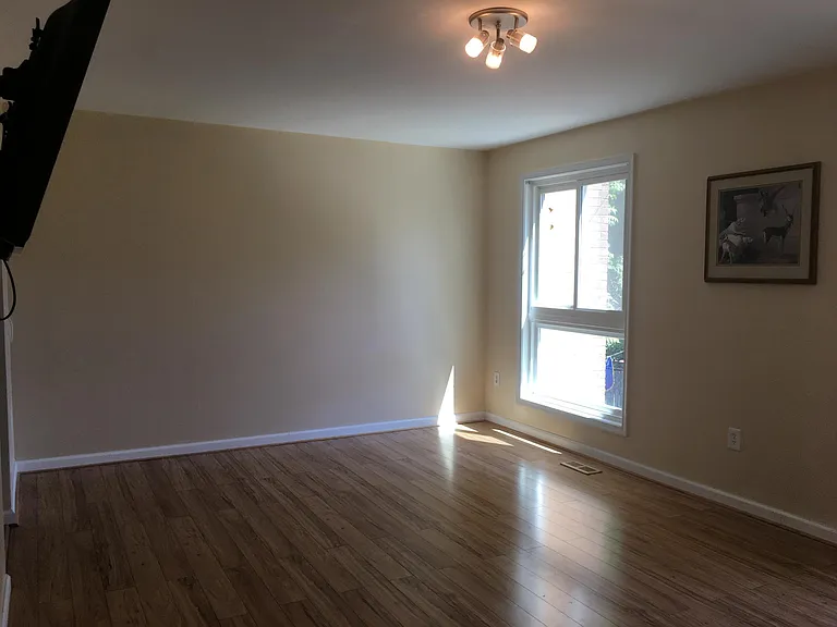 Living room w/ backyard views