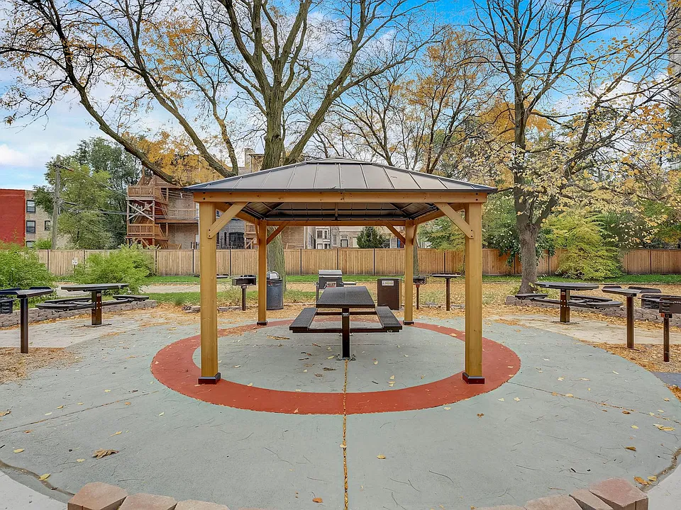 Gazebo with Commercial Picnic Tables and Plenty of BBQ Grills