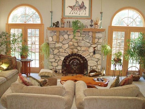 Stone fireplace with arch doorways