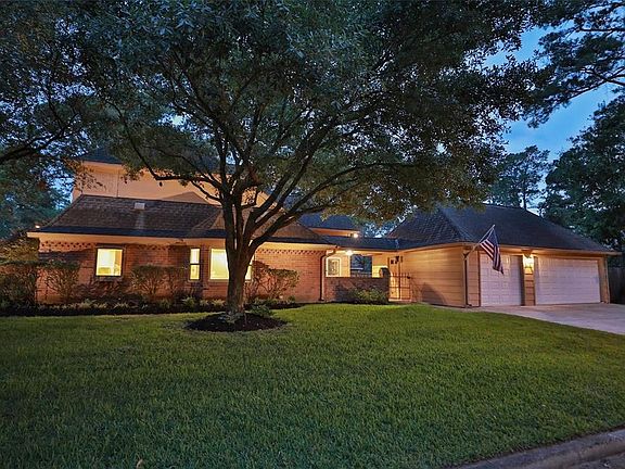 THE 3-CAR GARAGE IS OVERSIZED WITH A DOUBLE WIDE DRIVEWAY