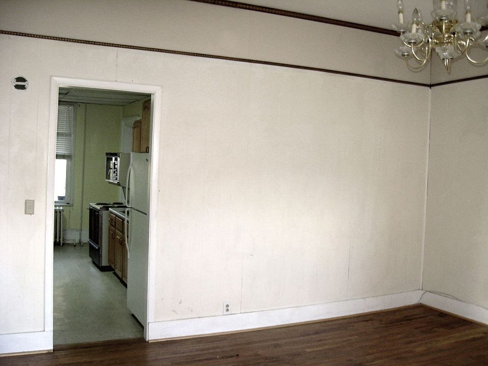 Rear view of living room looking into kitchen