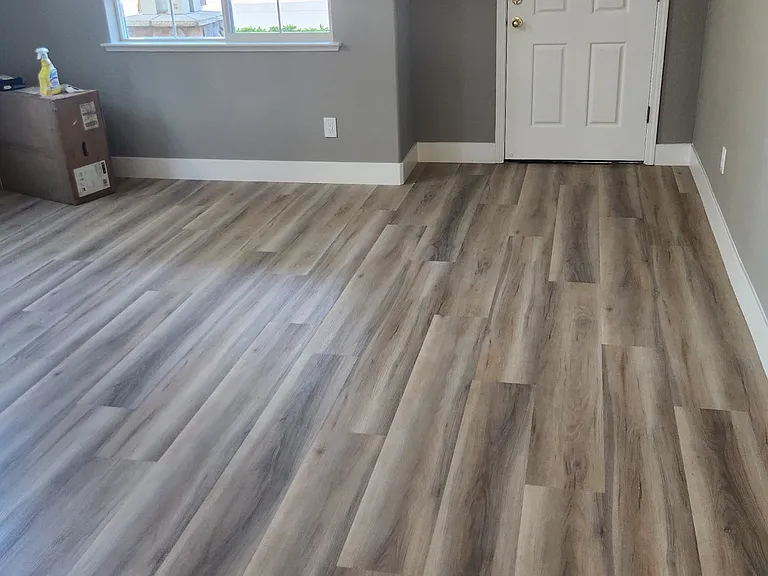 Large living room 9 in vinyl plank flooring thru-out the home