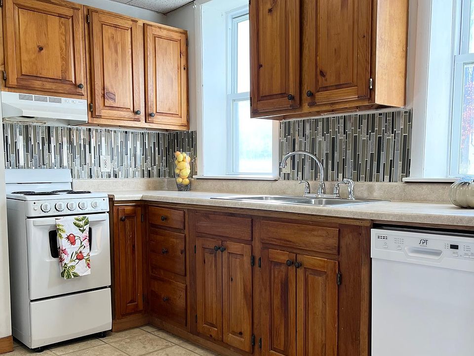 Kitchen with new dishwasher and refrigerator