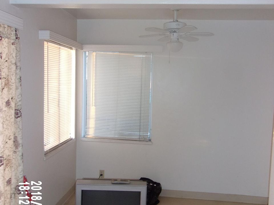 Kitchen area This location has upgraded blinds this is an old picture as you can see the date taken Will post revised pics soon!