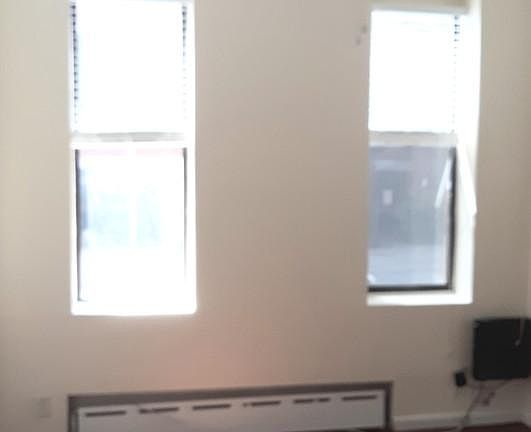 King-Sized Bedroom w Ceiling Fan