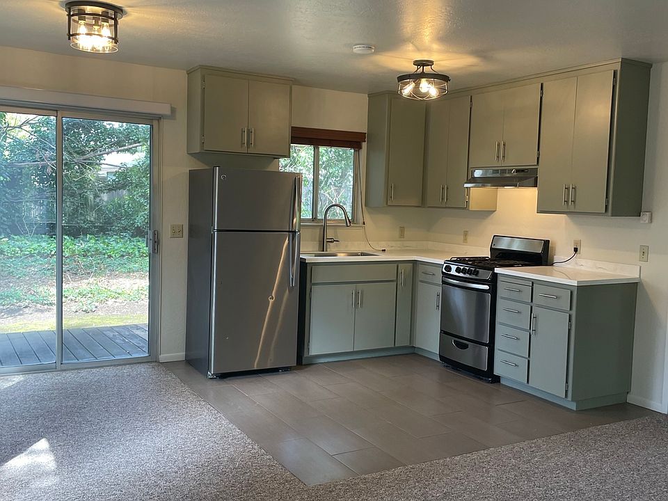 Main room and kitchen. Brand new solid-surface countertops.