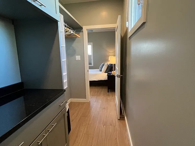 walk in closet with storage and Washer and dryer
