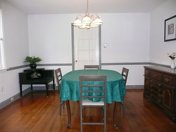 Formal dining room with hardwood floors