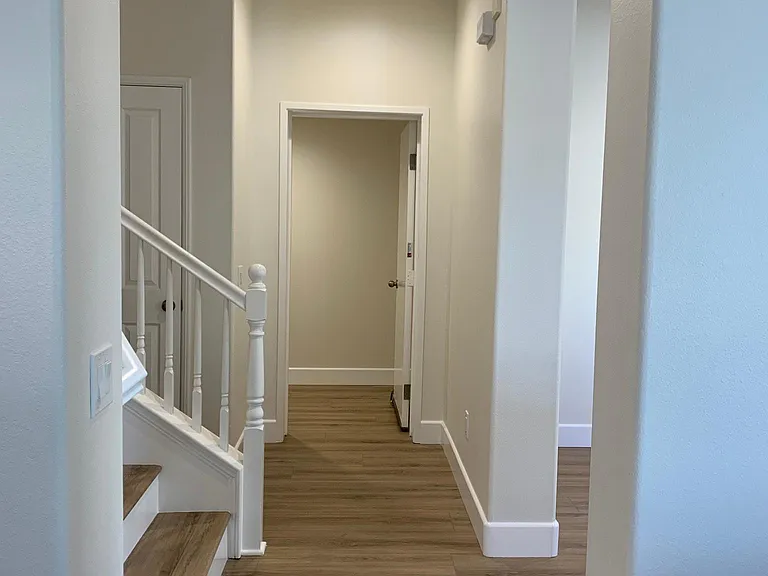 Hallway leading to Laundry Room and Garage Access