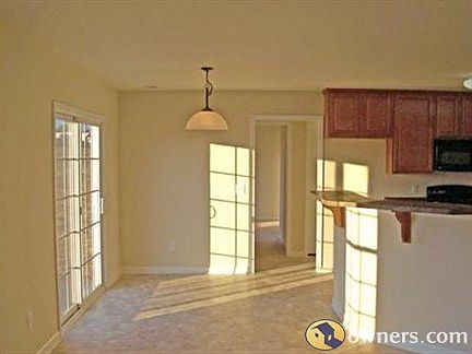 Kitchen Opens to Breakfast Nook & Family Rm