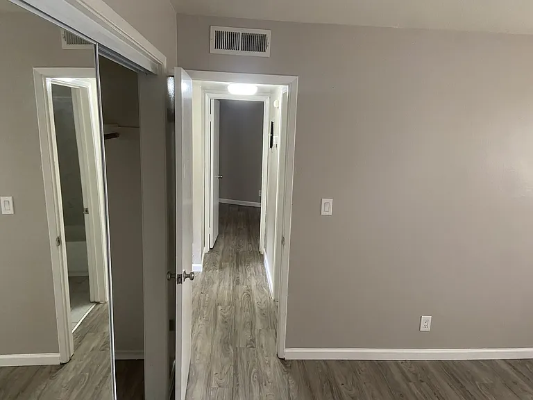 Central Heating & Air Conditioning, lots of upgrades throughout. Lots of closet space, high ceilings. Upgraded lighting fixtures. Top floor unit, one all hardwood floor, Other unit has new carpets in bedrooms. Schedule a tour today!