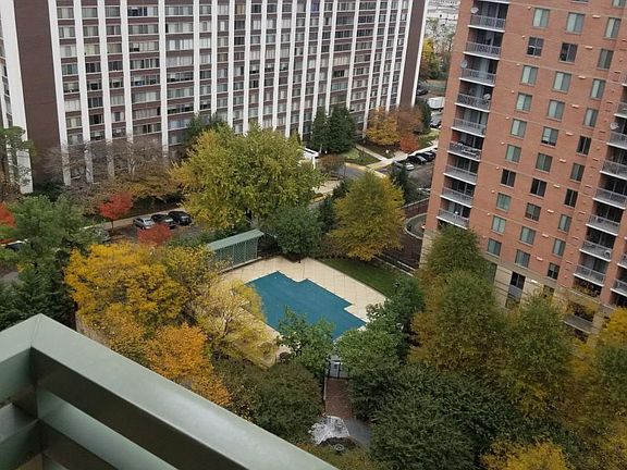 view of the pool from spacious balcony