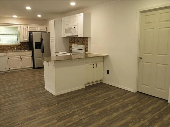 kitchen area and door to room #2