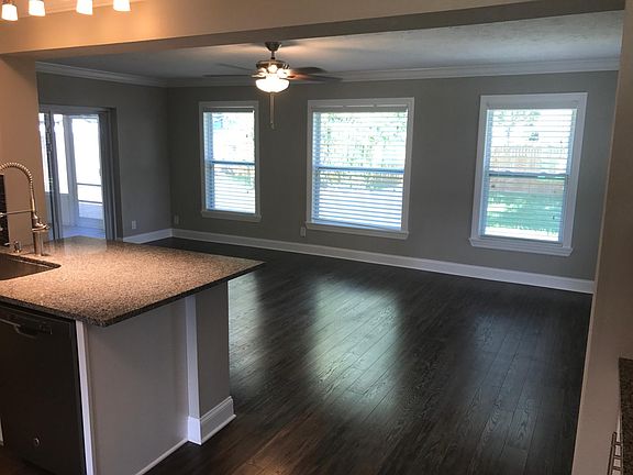 Open Living Area. Sliding door to enclosed patio and fenced