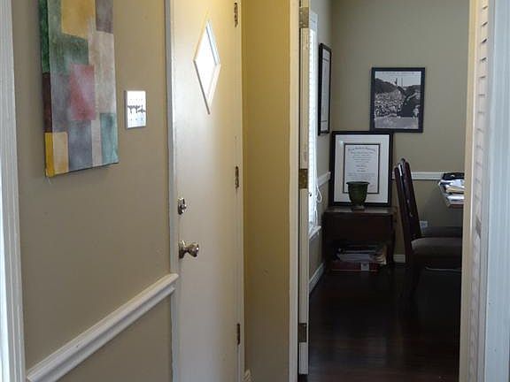 Welcome! Come on in! The hardwood floors have been refinished and are really attractive.