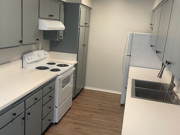 Newly remodeled kitchen with smooth ceilings and new countertops