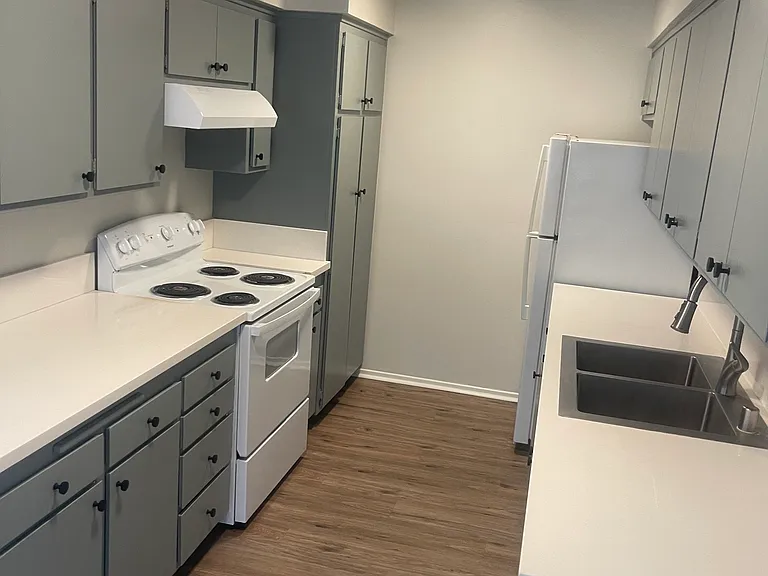 Newly remodeled kitchen with smooth ceilings and new countertops