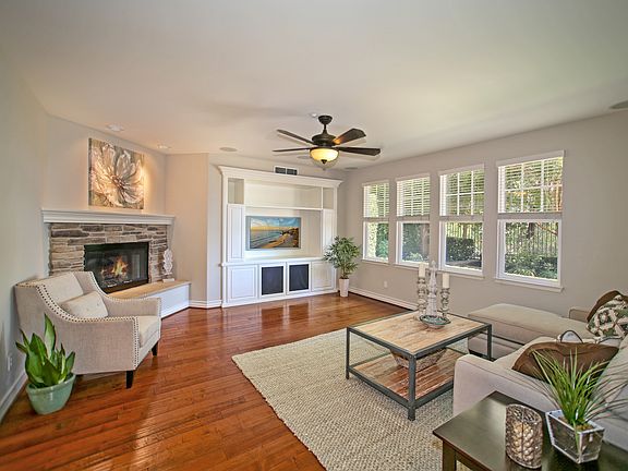 Family Room with Built-In Media Center with Surround Sound and Fireplace