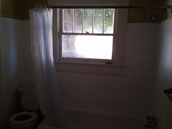 Bathroom with shower. Very efficient.