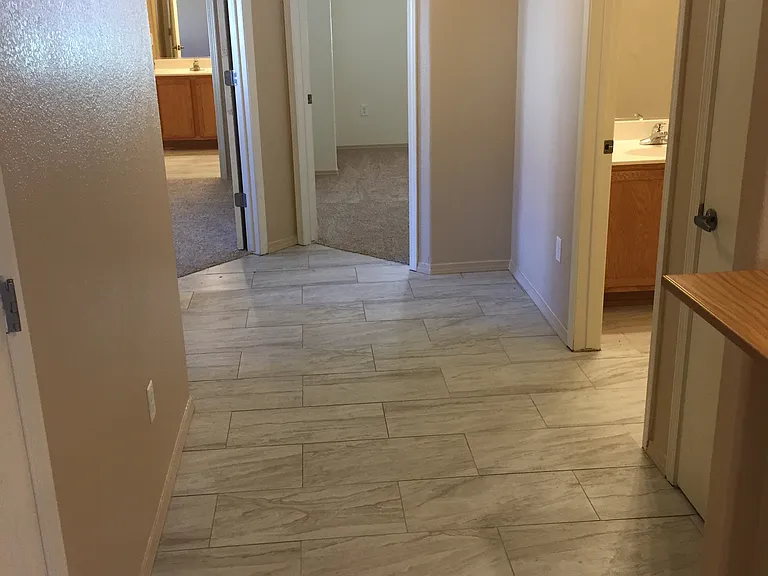 Hallway to bathroom and bedrooms