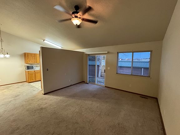 Spacious Living Room with Vaulted Ceilings