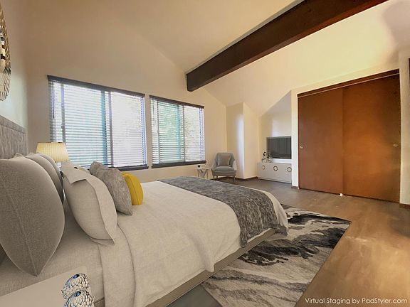 Master Bedroom with vaulted beamed ceiling