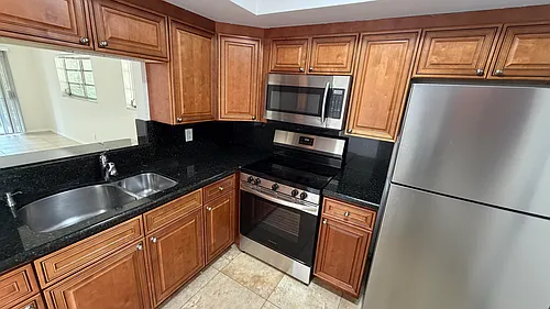 4061 NW 9th Ave #206 Photo 1