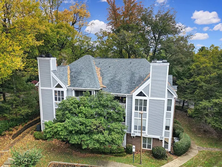 Exterior image, condo is first floor, no stairs! Plenty of green space for animals.