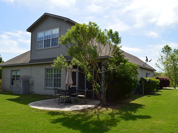 Rear patio and screen porch