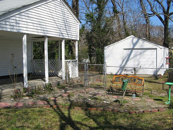 Carport & Detached 1.5 Car Garage
